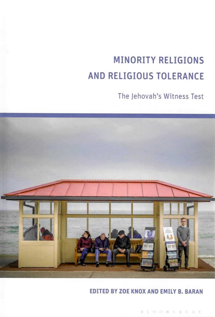 book cover, people sitting on bench by lake, chapter inside by Honors College Dean John R. Vile